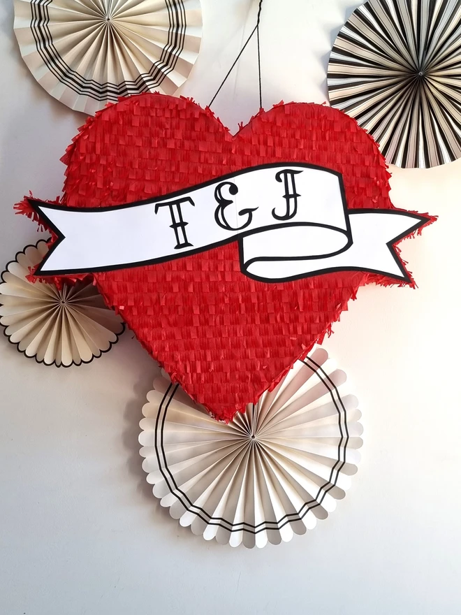 Personalised tattoo heart pinata