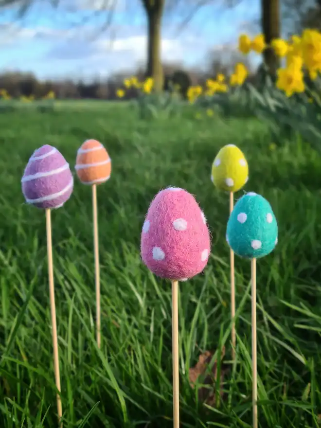 felt Easter eggs on bamboo sticks