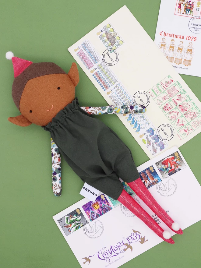 Textile santa's helper doll 