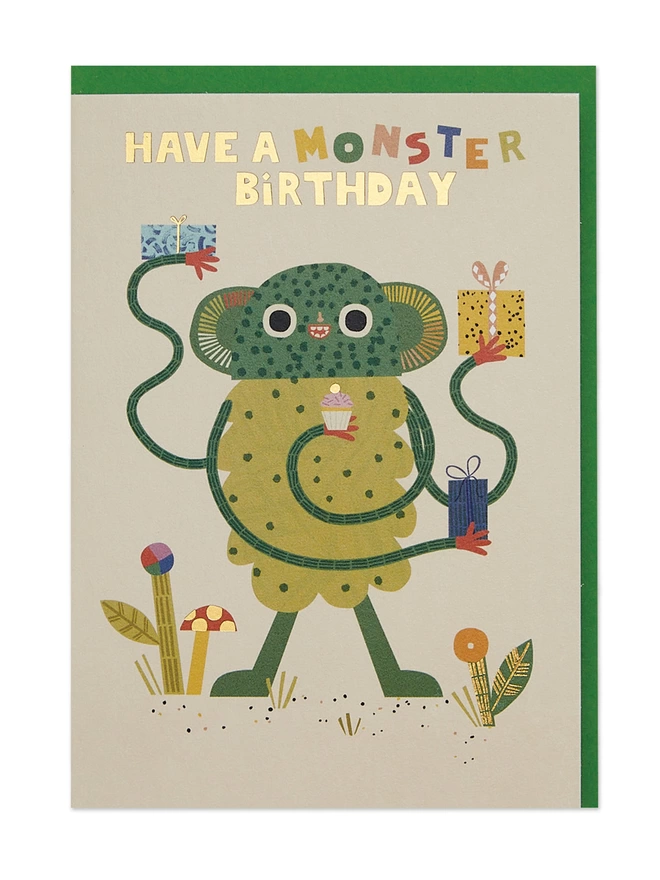 Raspberry Blossom Children’s Birthday card featuring a vibrant illustration of a fun green monster with four arms, all holding birthday presents and a little birthday cake. The design has special gold foil details and a playful ‘Have a monster Birthday' message