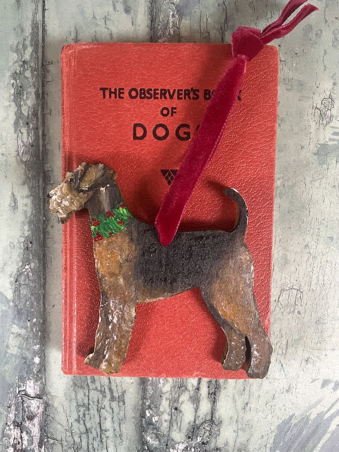 Airedale Terrier Handpainted Christmas decoration with red ribbon to hang 