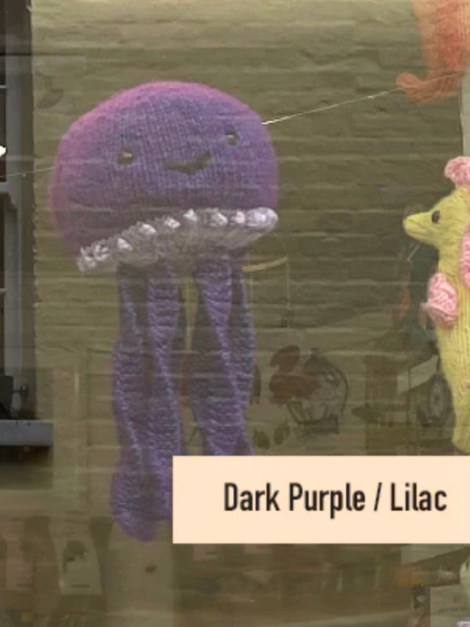 Jellyfish Knit Kit. A jellyfish in dark purple/lilac