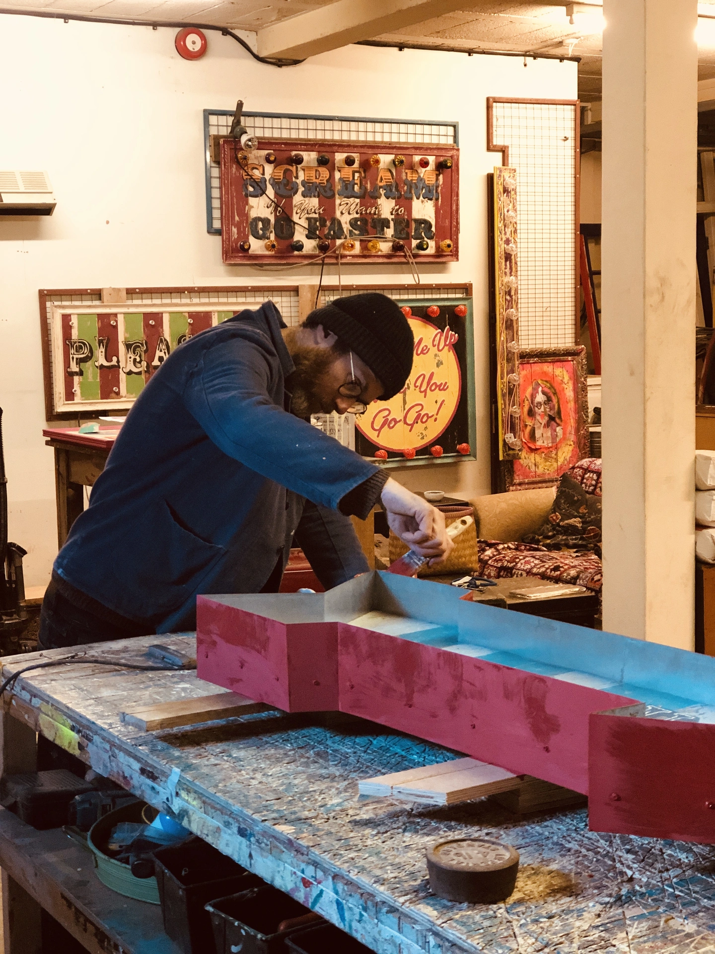 Dusty the lead maker for Argent and Sable signs. Making a fairground and circus inspired sign with lights in our norwich studioMaking Mad House Light Up Sign 