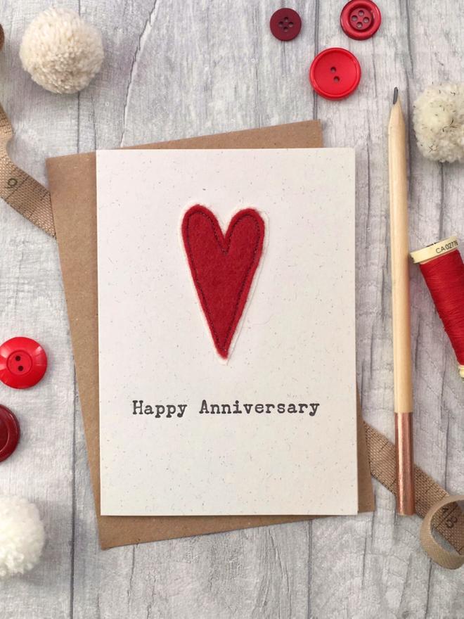 letterpress anniversary card with an embroidered red wool heart
