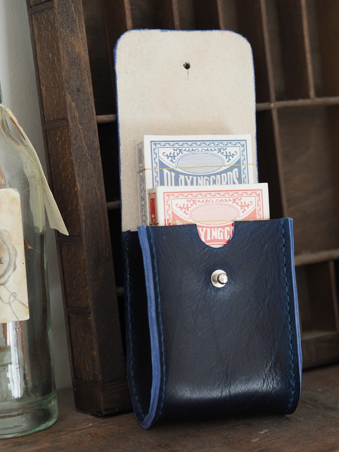 Handmade Leather Double Deck Playing Card Holder. Hand dyed dark blue leather pouch carrying two brand new packs of playing cards.