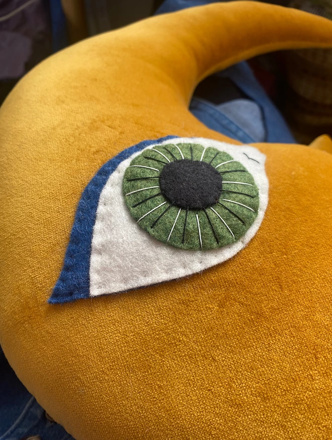 close up of handstitched eye of the moon 