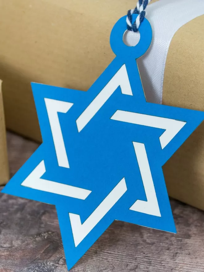 Closeup of blue and white Star of David Hanukkah Gift Tag