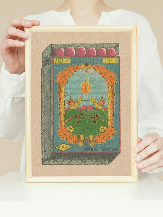 Step into a dreamlike vintage world with Paradiso Matches – Birdy, a richly detailed print inspired by old matchbox labels and folk-art iconography. Two mirrored birds hover mid-air beneath a floating flame, framed by curling vines, golden leaves, and distant rose-colored mountains. The composition feels symbolic and timeless—part love story, part talisman.  Muted greens and sky blues contrast with warm ochres and reds, all layered with a soft, grainy texture that evokes antique printing and quiet nostalgia. Equal parts playful and mystical, this artwork invites slow looking and rewards it with intricate detail and balance.  Perfect for collectors of vintage-inspired art, nature lovers, or anyone drawn to symbols of connection, warmth, and spark.