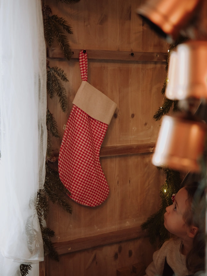 Red Christmas stocking ornament for festive holiday decor Handmade red Christmas stocking decoration for the Christmas tr