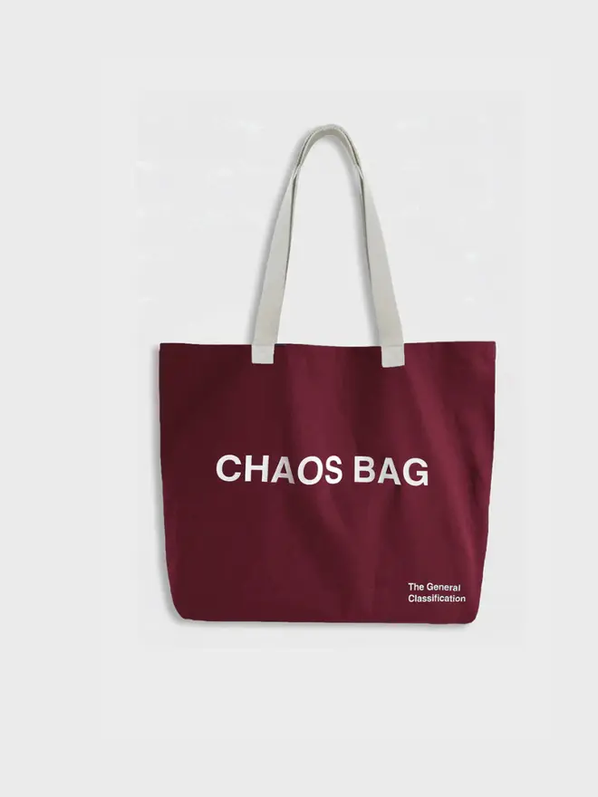 'Chaos' Tote Bag, against a grey background. 