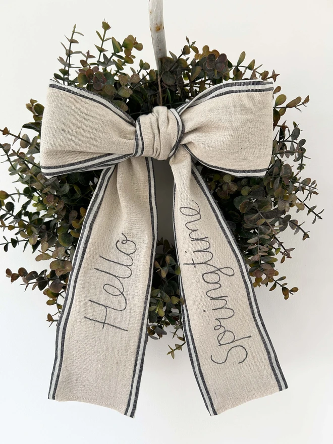 hello spring bow on wreath