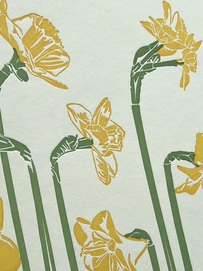 Detail image showing the letterpress impression of the spring colours into the crisp off white paper stock