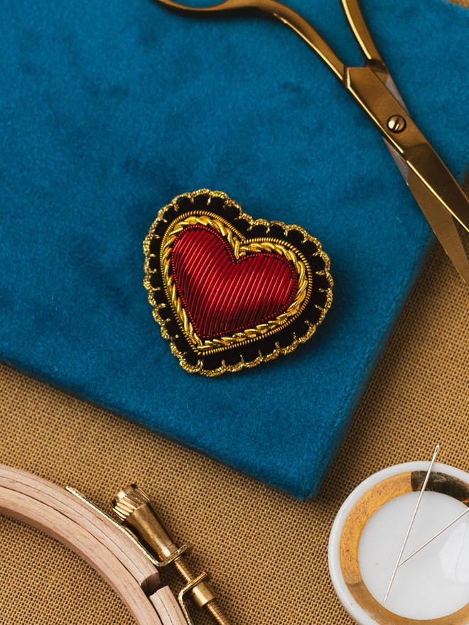 goldwork heart brooch on velvet board