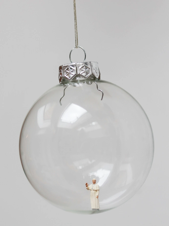 Miniature figure of the Pope in a glass hanging christmas bauble 