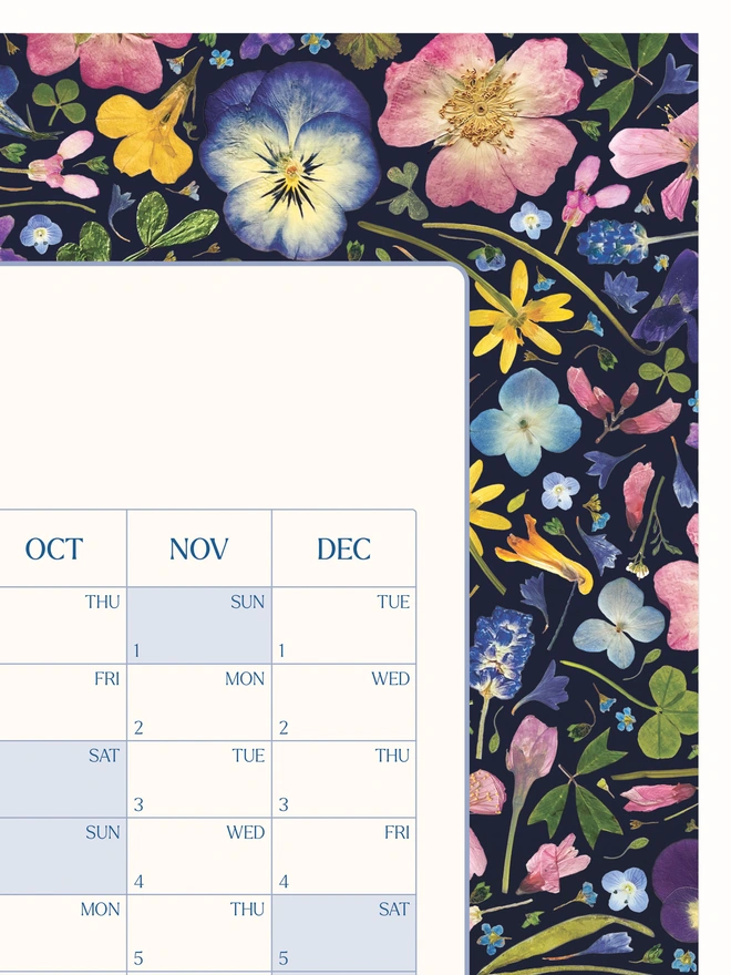 Pressed White Floral 2025 Wall Calendar – A botanical-inspired yearly planner with stunning pressed white flowers. Ideal for workspace decor, home offices, and studios. Great Christmas or birthday gift for planning and organising.