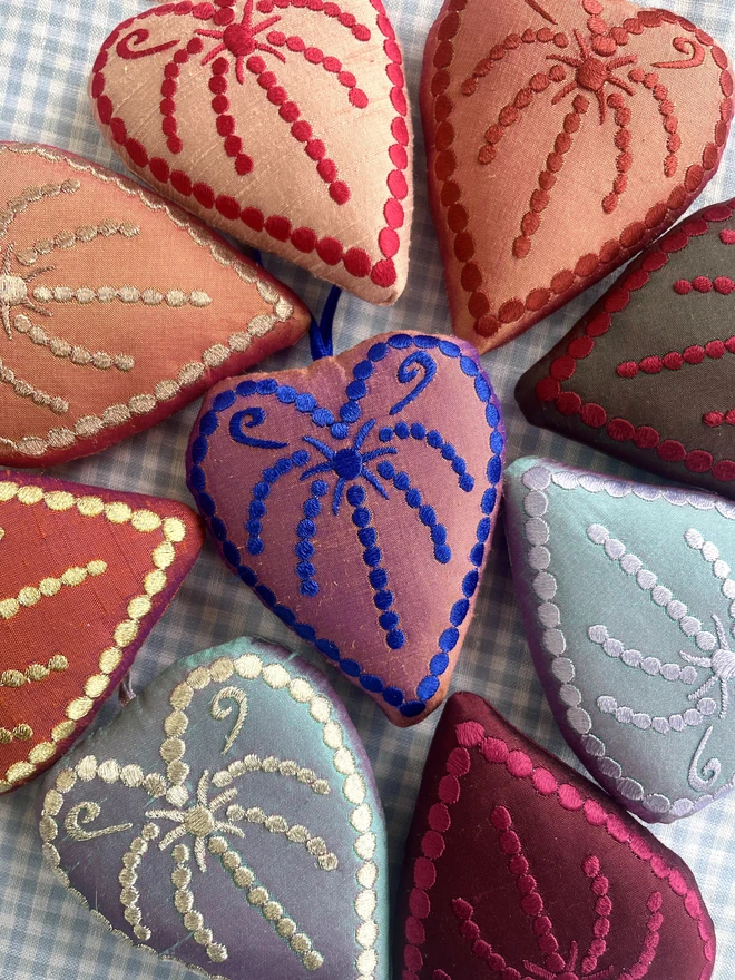 Silk heart ornaments with hand-guided embroidered deign - circles and swirls inspired by victorian embroidery