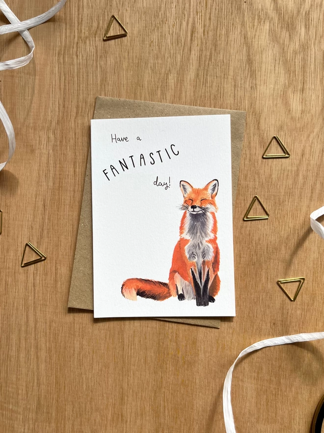 Greetings card with a happy looking red fox and the phrase ‘have a fantastic day”