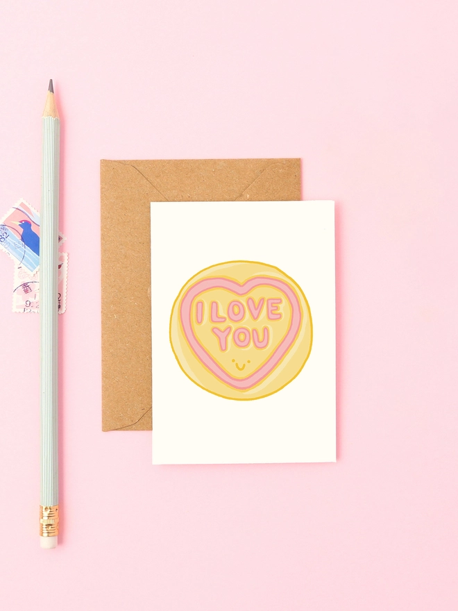 Cute mini card featuring a love heart sweet and the words 'love you'