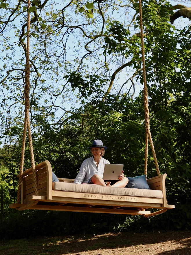 Jeanette working from home on her epic Swing Bench