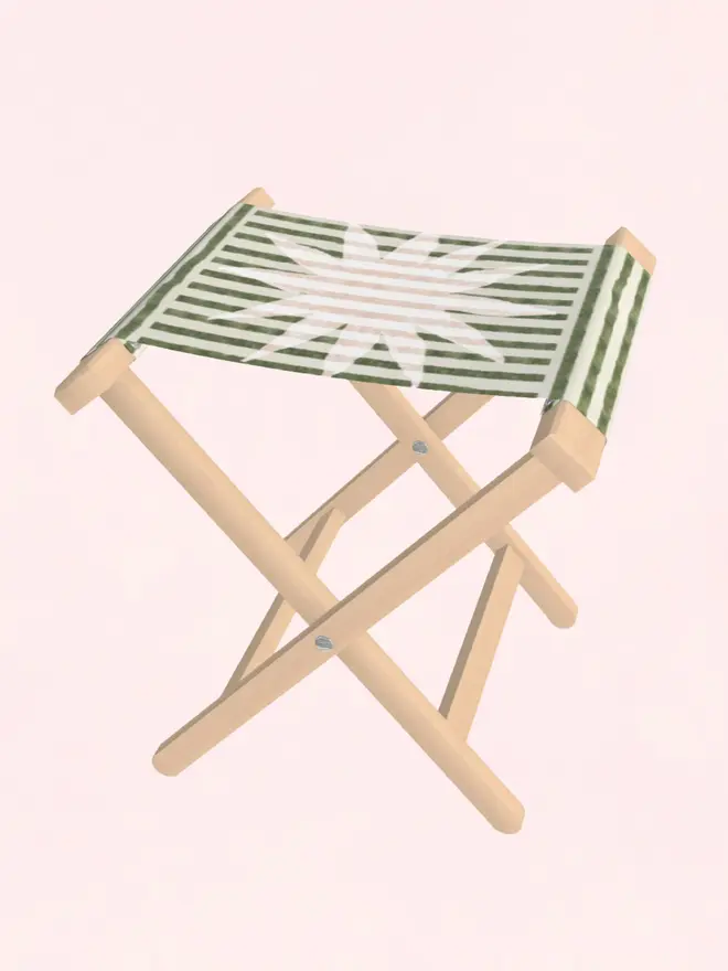 sun stripe folding stool. a green and white striped folding stool with a white sun motif.