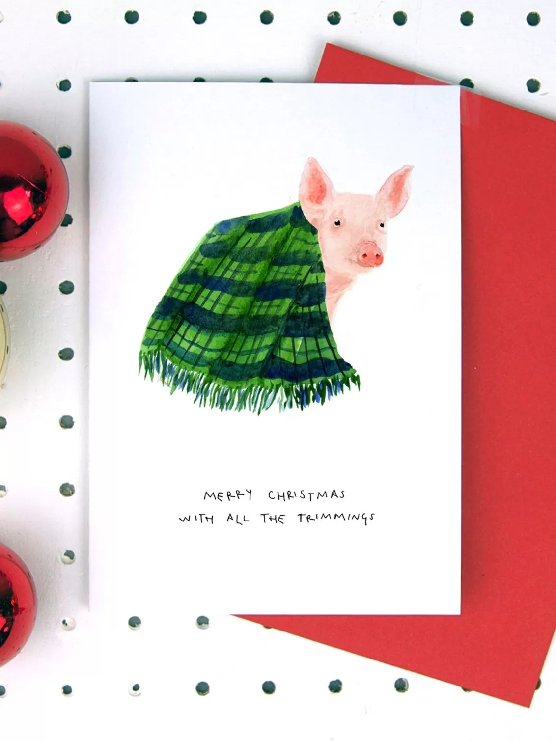 Blank Inside Pig In Blanket with Merry Christmas written underneath.