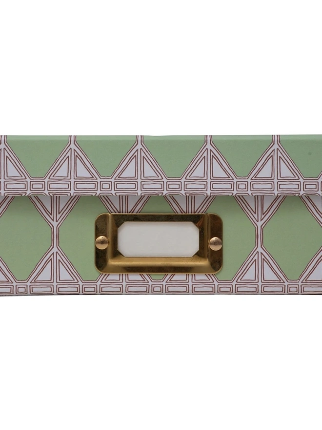 Tijan Lidded Portfolio Box, a colourful portfolio box sitting on a plain surface. 