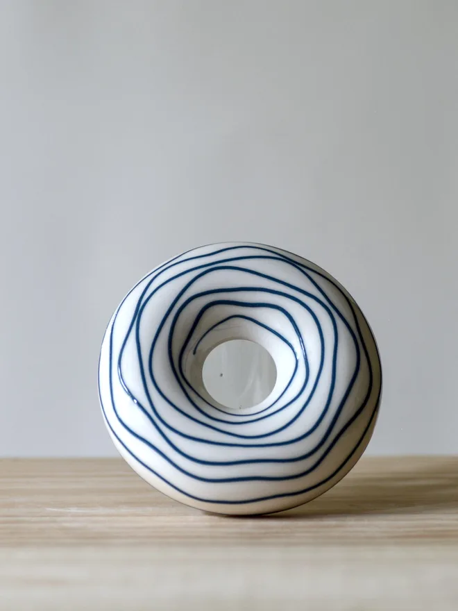 Avocado Planter White & Blue Handmade porcelain avocado planter with carved blue pattern, designed to hold an avocado seed for sprouting
