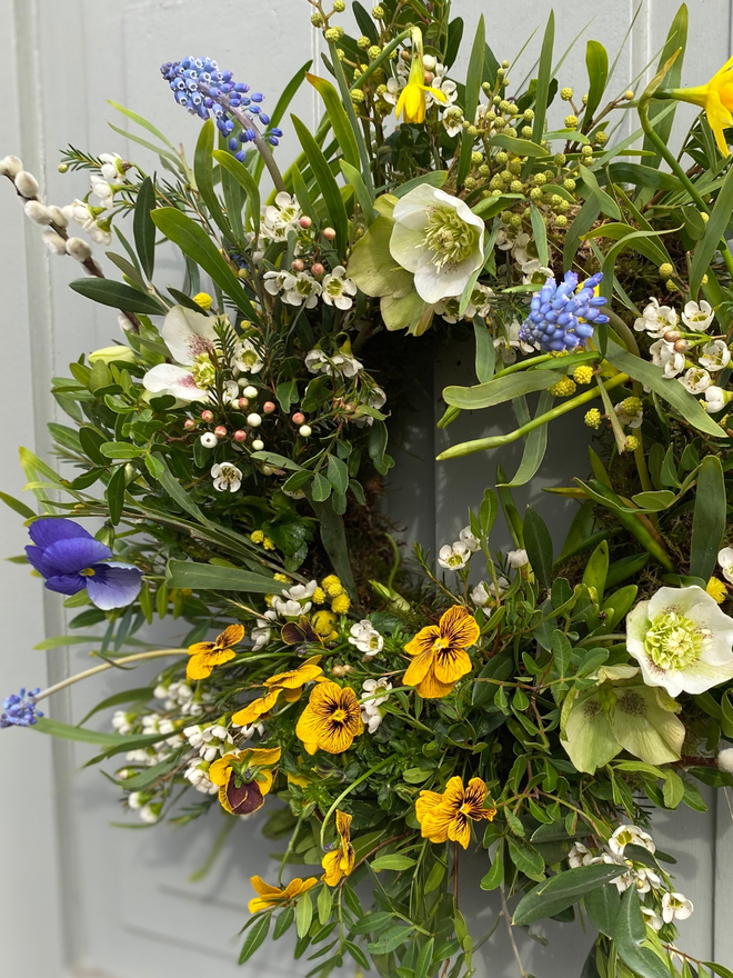 Fresh Spring Wreath with Bulbs Mimosa Viola Flowers