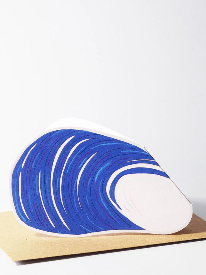 A cut out card of a mussel