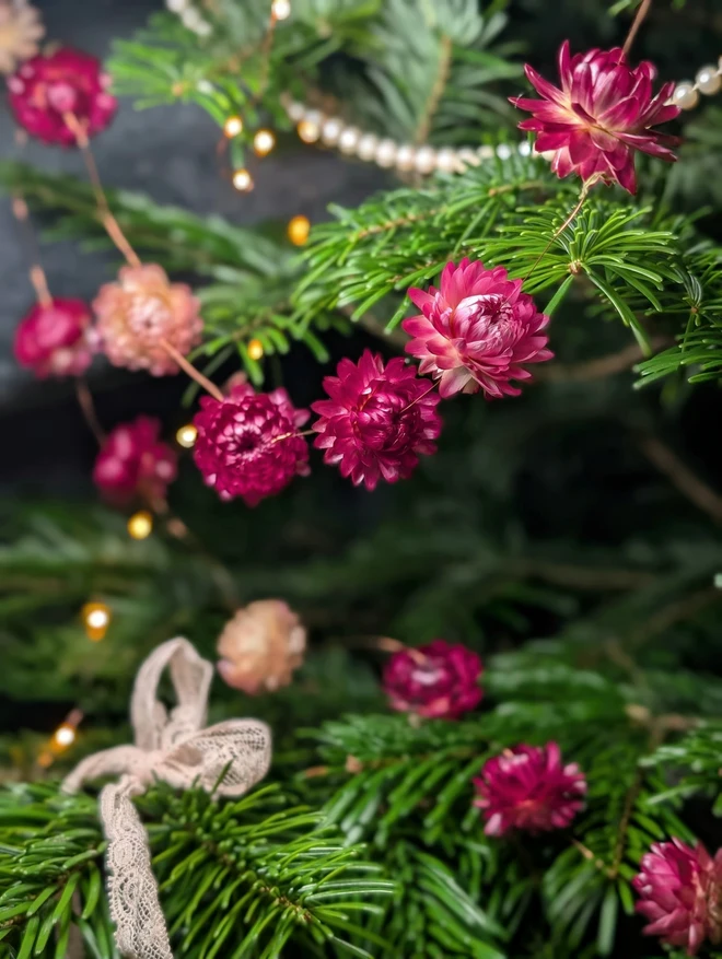 flower garland on a christmas tree