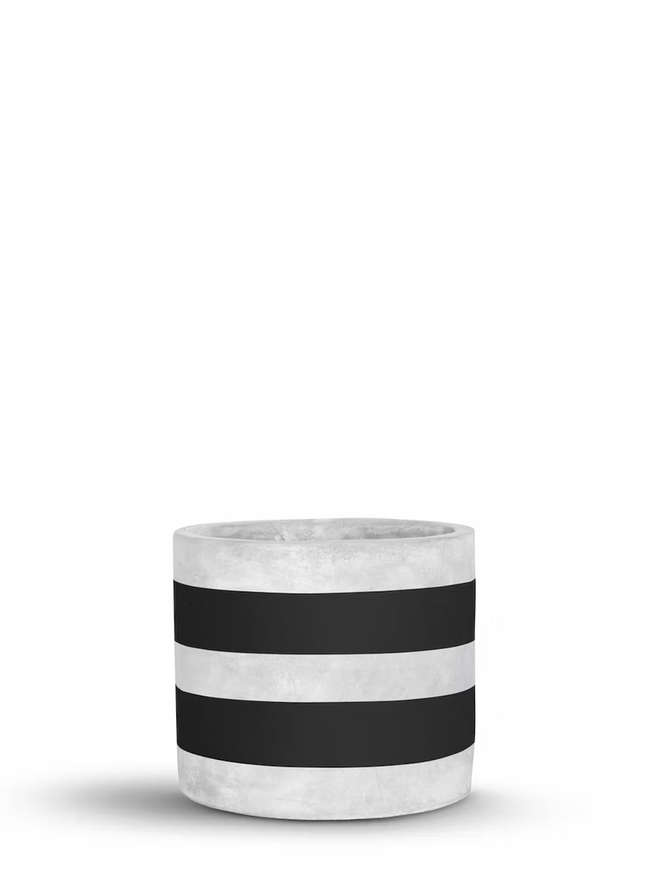 two stripes concrete plant pot. a grey plant pot with black painted stripes.