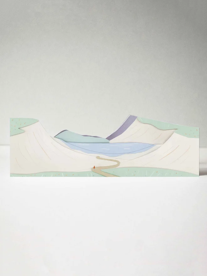 Cut out card of dunes