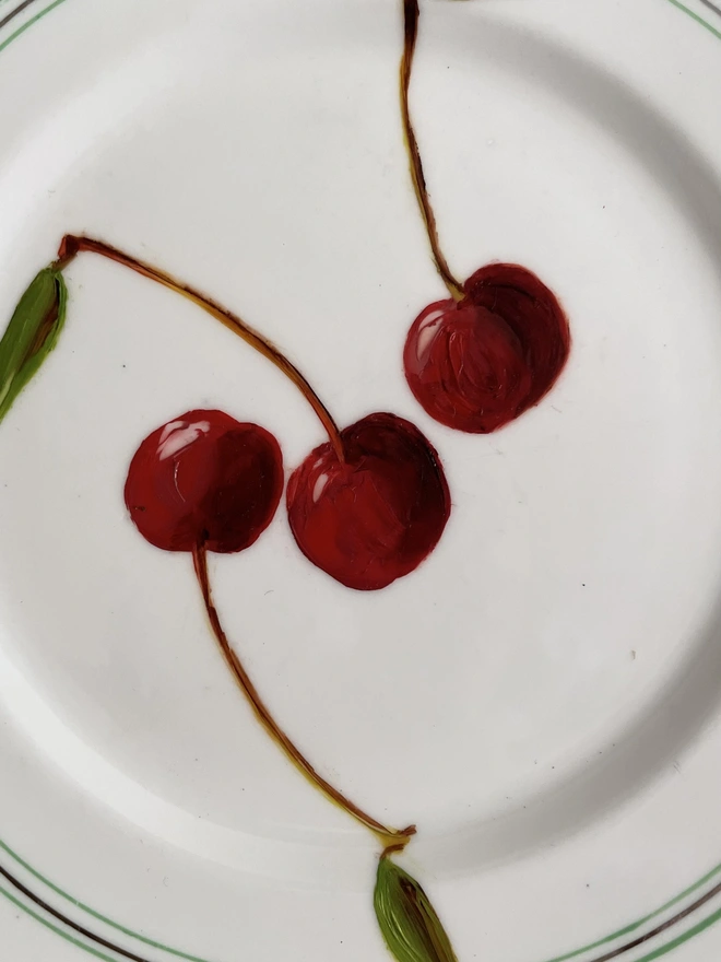 detail of 3 red cherries