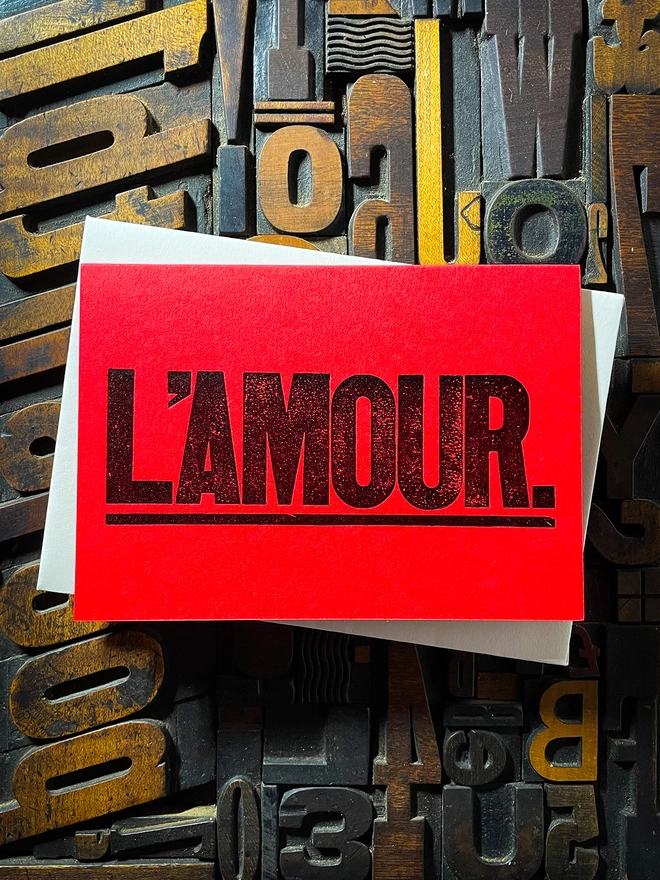 L'AMOUR. Perfect to send a special message to a loved one. These cards are letterpress printed. The card is hand-fed into the press. Printed on the finest Colorplan Pristine White double-sided card.  Matching Colorplan 135gsm self-seal envelope.