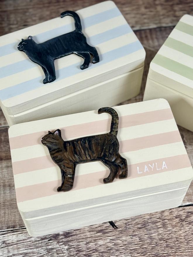 Pink and cream striped small wooden keepsake box with a hand - painted wooden tabby cat 
