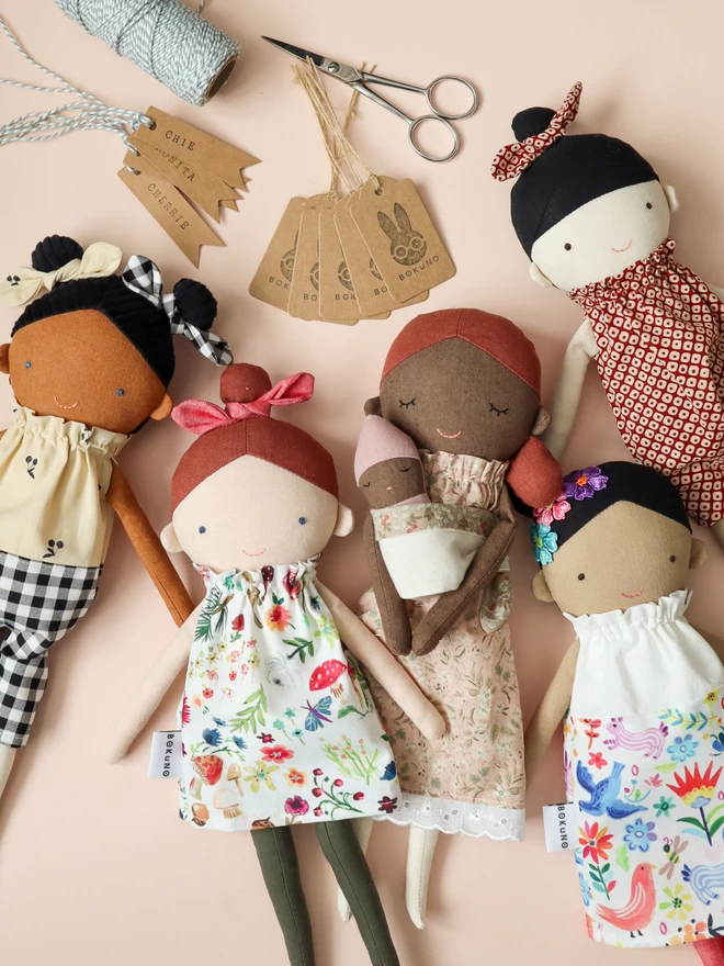 diverse five fabric stuffed dolls multi cultural