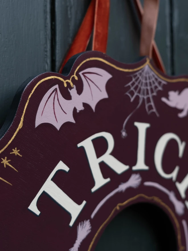 Purple and lilac Halloween Wreath with cat, bat and cobweb details and gold line work