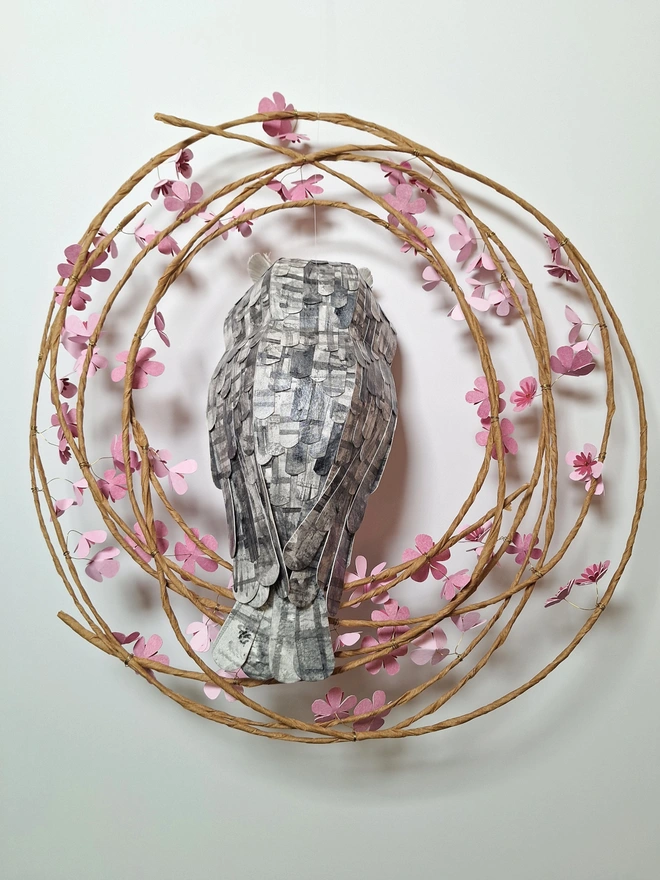 back view of a handmade owl wall art sculpture