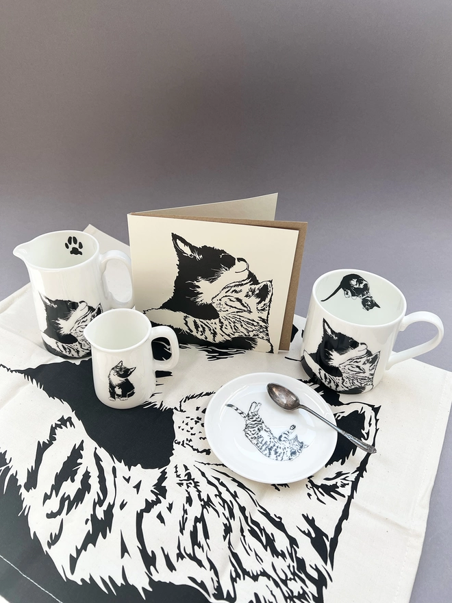 Other cat products we have to offer includes ceramics and tea towels