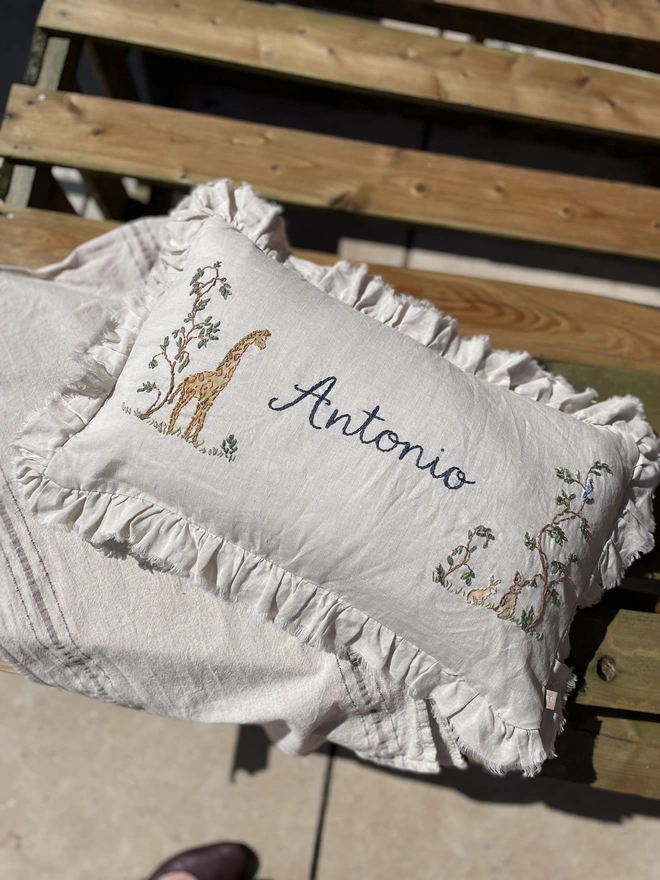 Soft Linen personalised cushion with giraffe and bunny motif - blossom and bramble embroidery