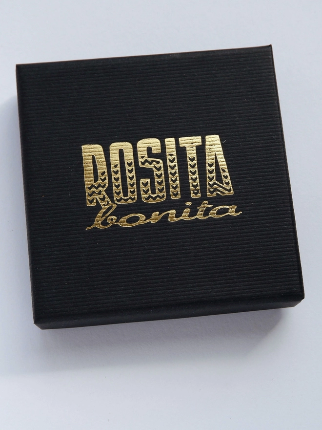 black gift box with rosita bonita logo in gold