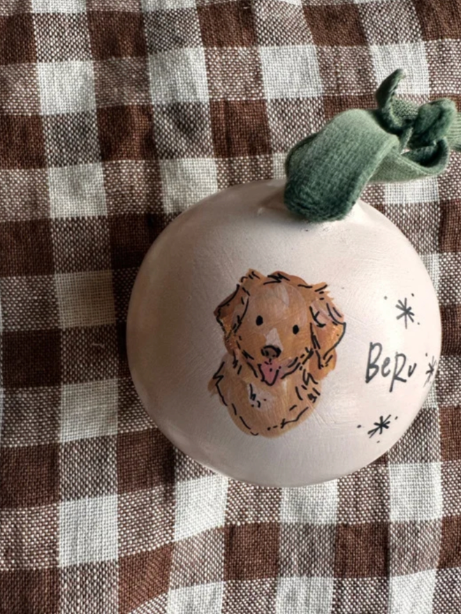 Personalised Illustrated Bauble. A bauble with a personalised illustration.