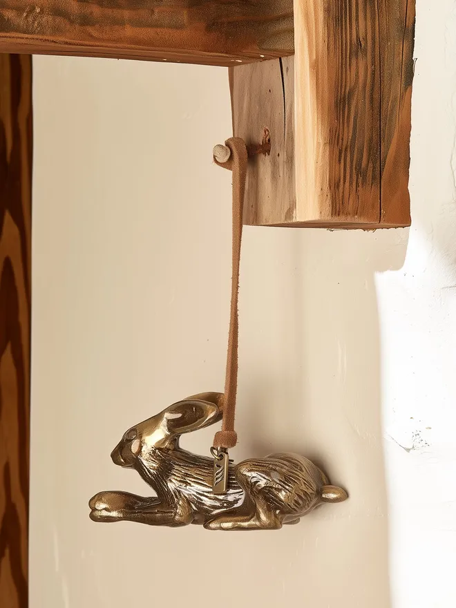 brass hare christmas decoration with suede cord