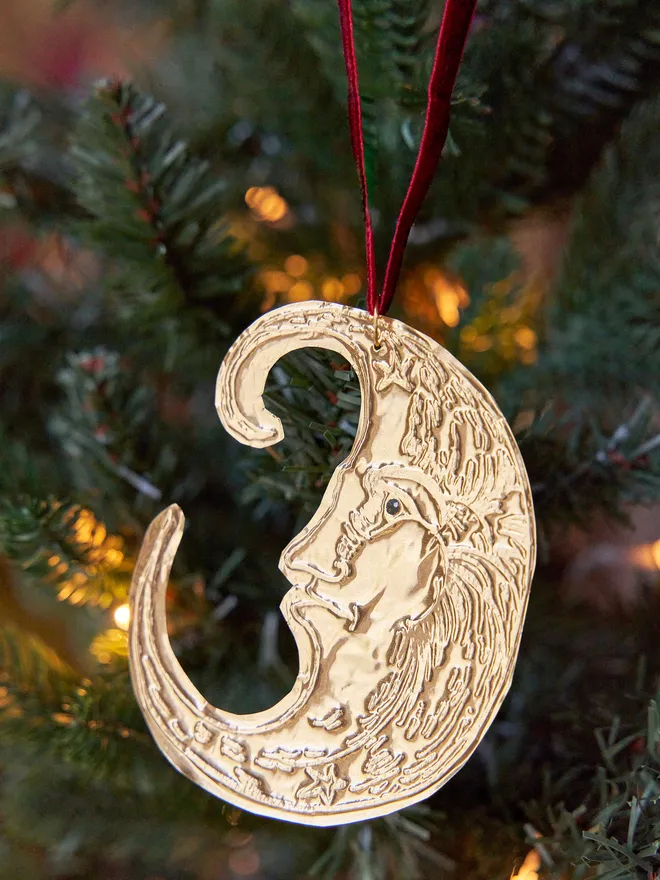 Moon tin embossed Christmas tree decoration