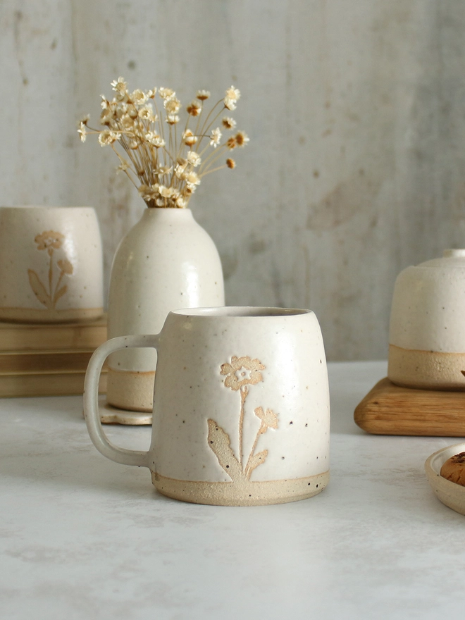 Primrose white mug on table setting