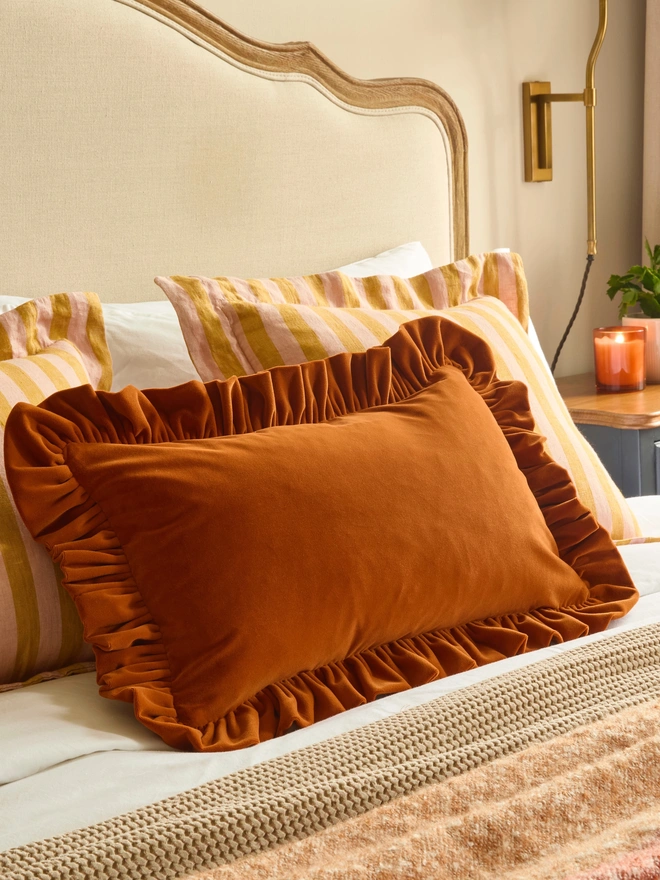 Handmade ruffled velvet lumbar cushion 50x35cm with feather pad, rust, Kika Bespoke