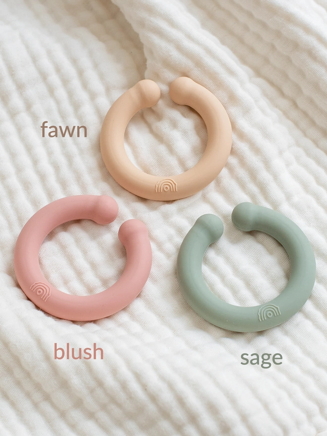 Silicone rings in fawn, blush and sage colours.