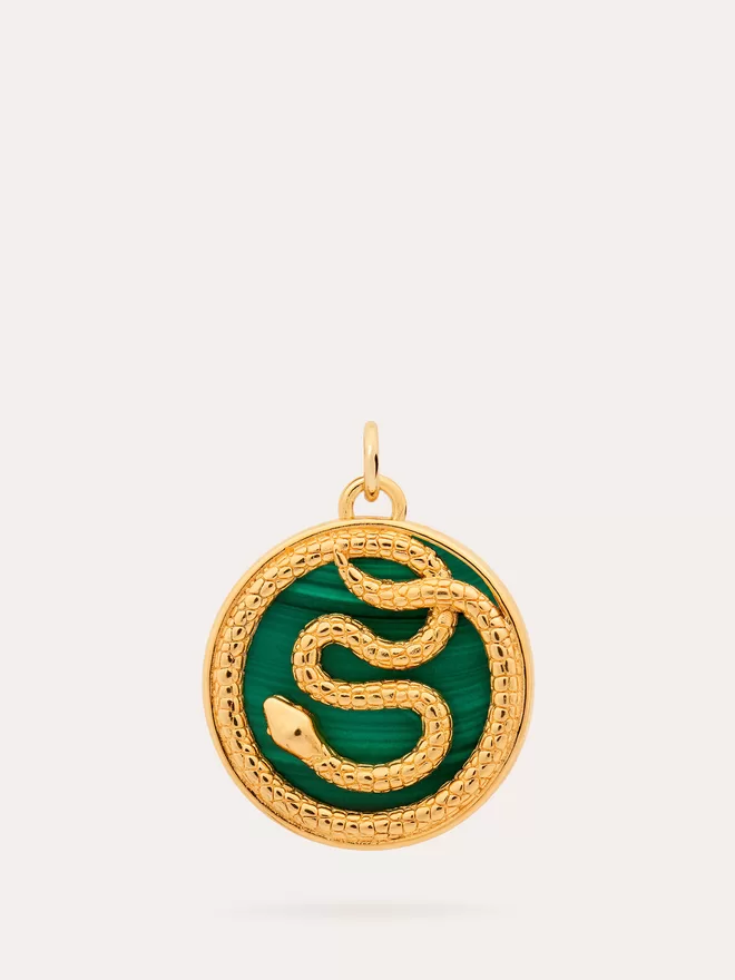 Front view of Aesclepius Snake gold Medallion on malachite stone