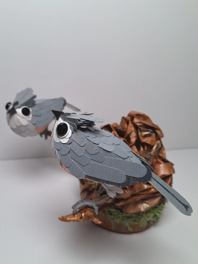 Tufted Titmice on a trees tump handmade bird sculpture