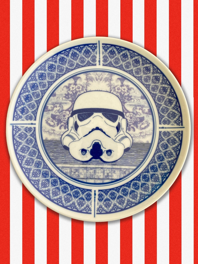 Delft style blue and white 8" plate featuring a Stormtrooper head in the centre
